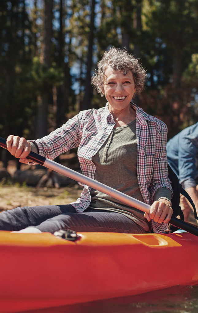 portrait of smiling senior woman on a kayak our core principles germantown wi